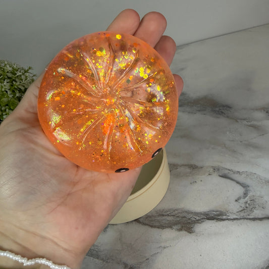 Squishy Toy - Viral Dumpling, Slow Rise Glitter - Light Orange-on hand