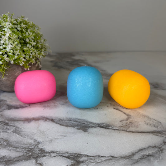 Squishy Toy - Sunlight Color Changing Gumdrop-on hand