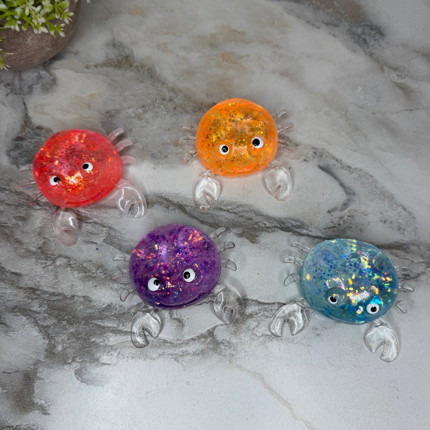 Squishy Toy - Glitter Crab-on hand