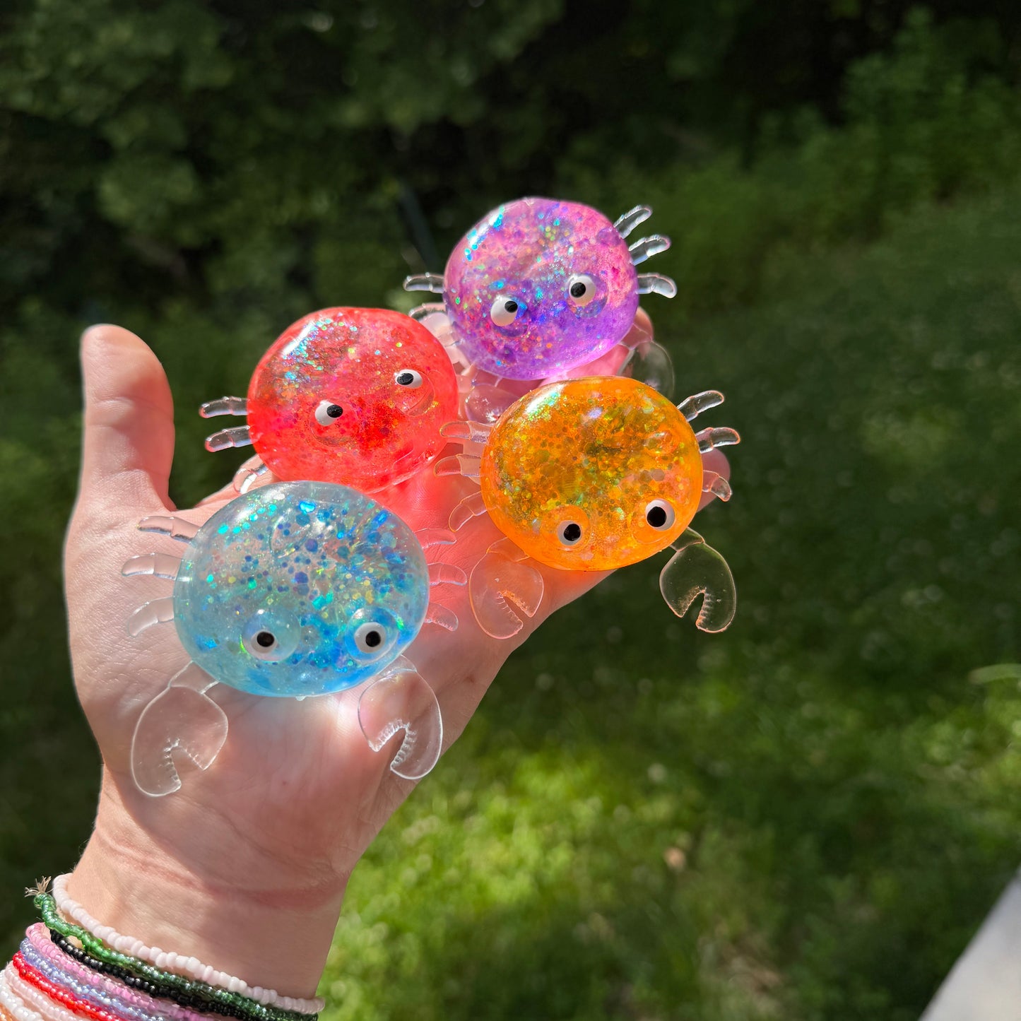 Squishy Toy - Glitter Crab-on hand