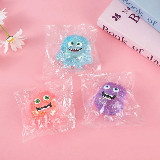 Squishy toy - Monster glitter-on hand
