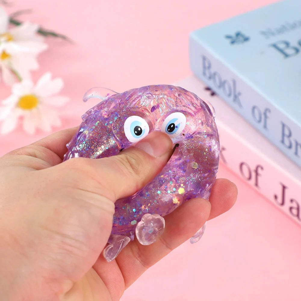 Squishy toy - Monster glitter-on hand